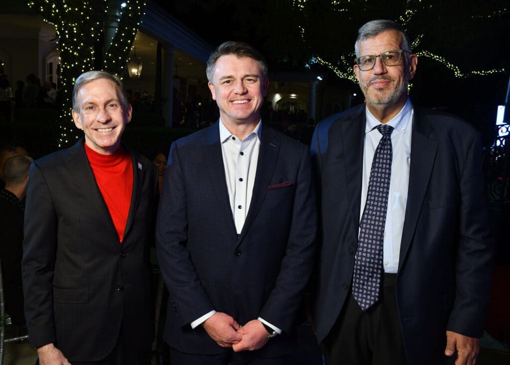 Dr. Peter Pisters, Chris McKee, Dr. Richard Gorlick at the Santa's Elves party benefiting the MD Anderson Children's Cancer Hospital