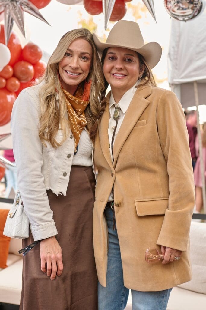 Britney Mahugh, Debra Slaughter at Cotton Holdings' tailgate party at the Lone Star Showdown. (Photo courtesy of Cotton Holdings) 
