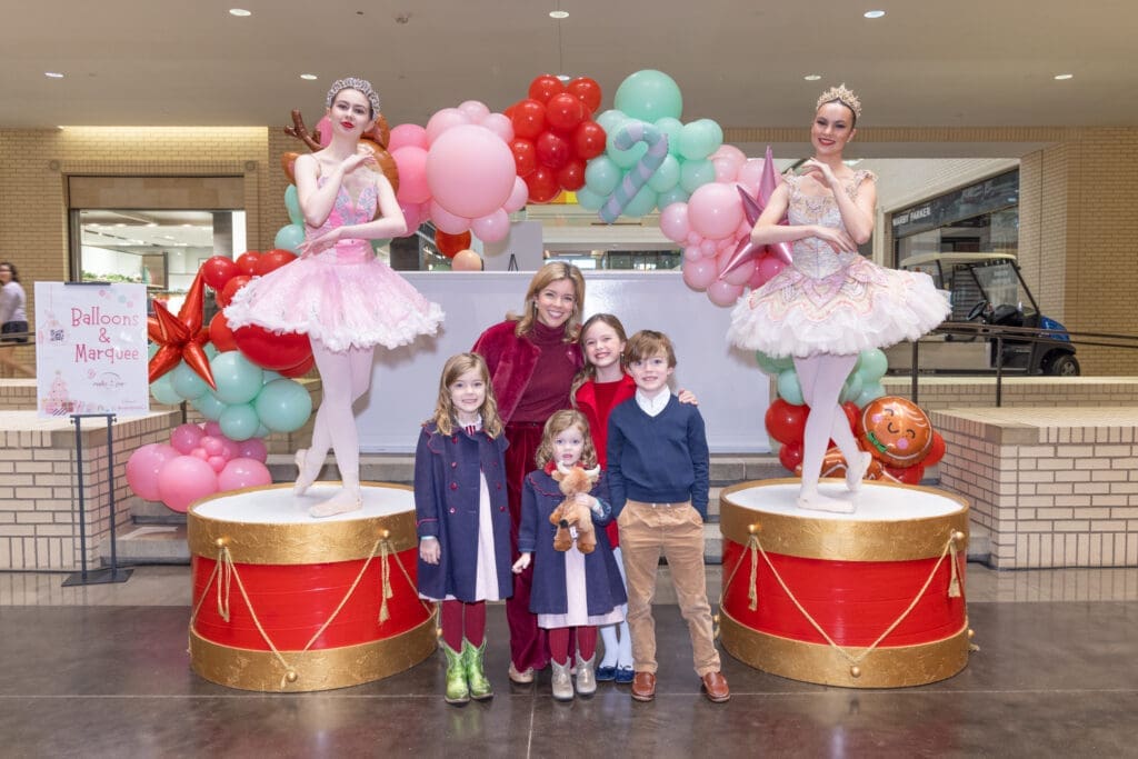 Claire Arnot and family with ballerinas at Breakfast with Santa. (Photo by Kim Leeson)