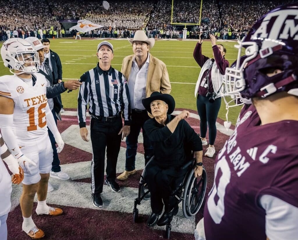 Lone Star Showdown coin toss with Cotton Holdings founder and co-CEO Pete Bell and Texas Governor Greg Abbott at the coin toss at the Lone Star Showdown. (Photo courtesy of Cotton Holdings) 
