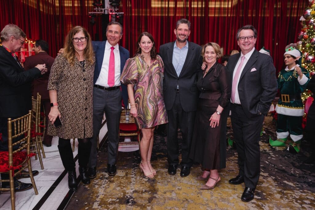 Dr. Kjersti Aagaard, Dr. James Versalovic, Jennifer & Matt Girotto, Charlotte & Dr. Thierry Huisman at the Ambassadors for Texas Children's Hospital holiday party. (Photo by Johnny Than)