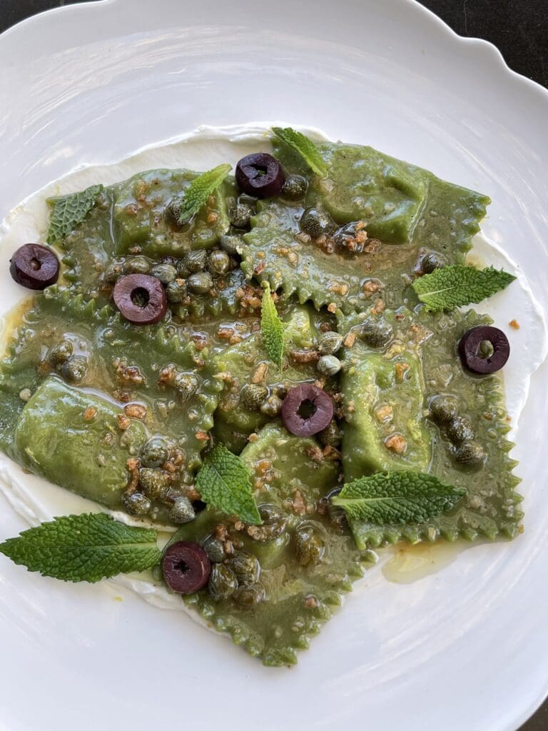 The lamb Tortelli at Pillar is served over labne with capers, olives, and mint. (Courtesy)