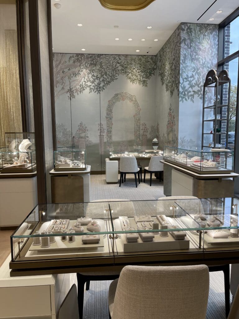 The bridal boutique area has custom Phillip Jeffries wall coverings, which disguise the entrance to one of the private VIP rooms at Thomas Markle Jewelers in The Woodlands.