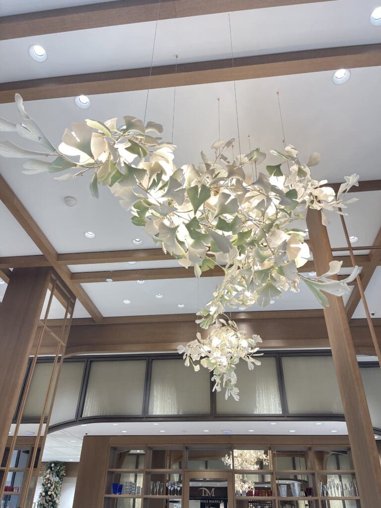 The chandelier is made of porcelian pieces, assembled on site.  It was created by French artist Andreea Braescu.