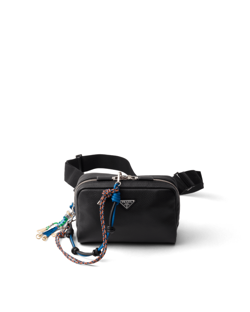 Prada leather shoulder bag with charm, 
$3,350, available at the Prada boutique.