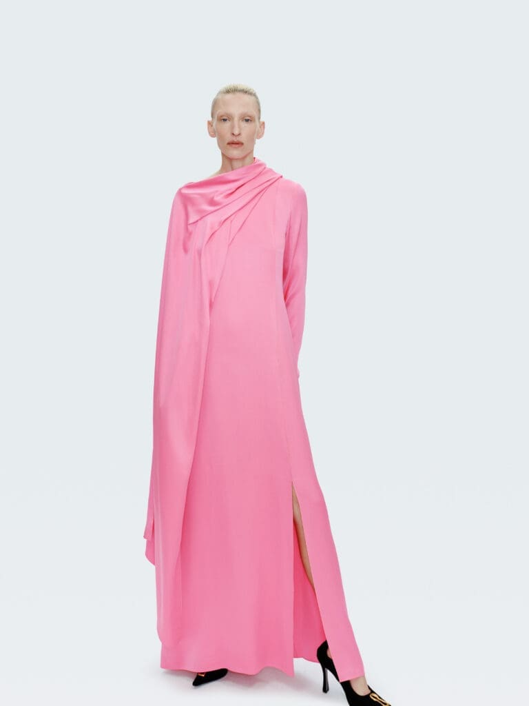 The capsule collection includes a "shocking pink" caped gown. (Courtesy of Schiaparelli)