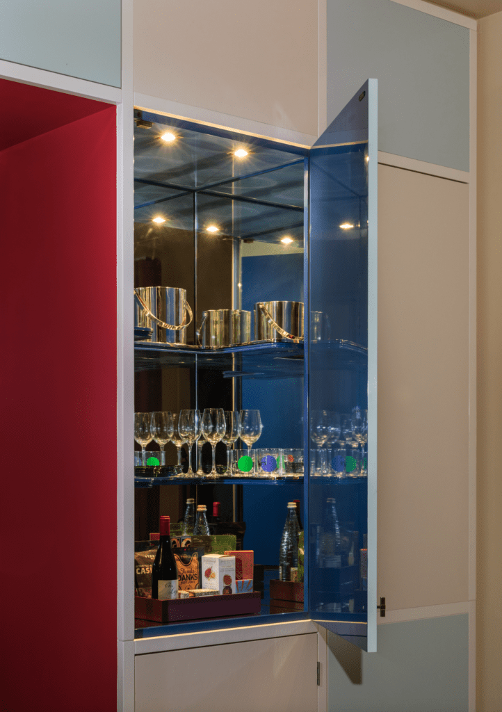 The cabinet bar with an Yves Klein blue interior is a reference to the de Menils' own drinks cabinet (Photo by Julie Soefer)