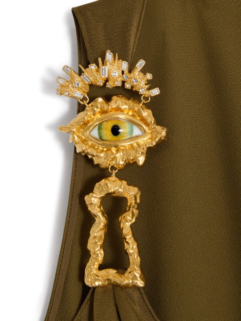 The evening gowns feature bijoux "codes" from the house, including the surrealist eye and keyhole. (Courtesy of Schiaparelli)