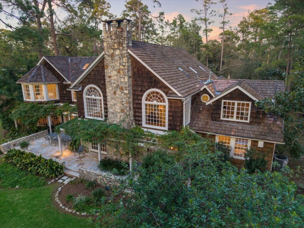  8899 Sandringham in Houston's Bayou Woods subdivision is a charming residence with 6,500 sq.ft. of living space (Photo by TK Images/Compass)