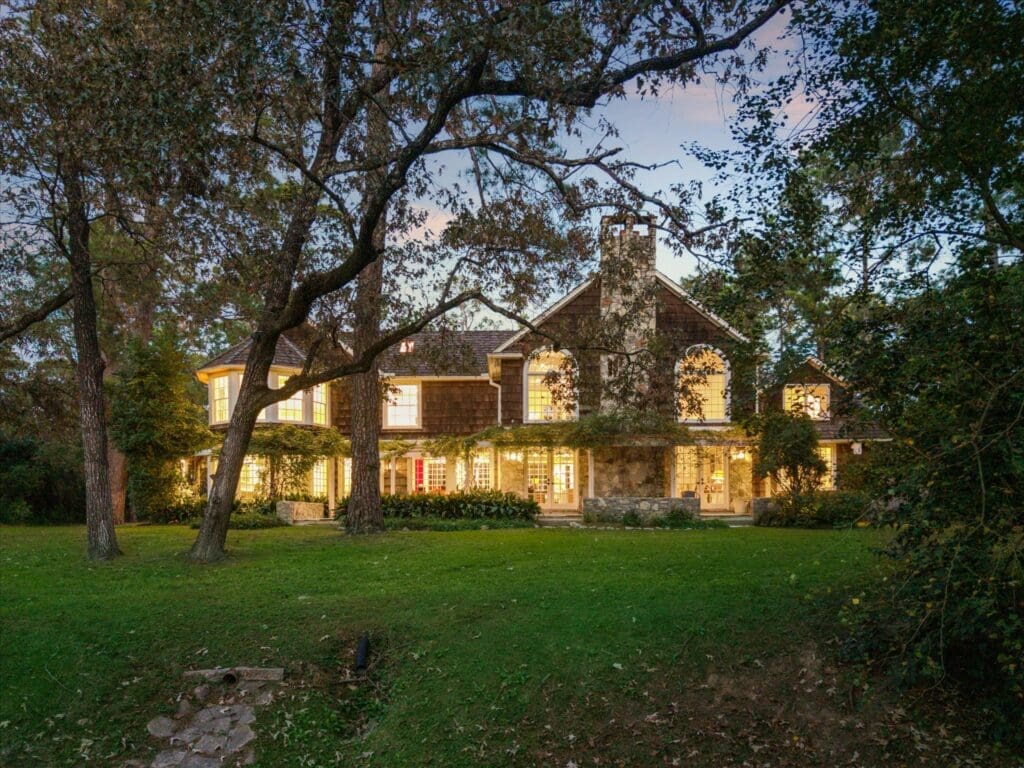 Houston’s Own Nantucket Mansion Is a $7.2 Million Stunner Hidden In a Forest of Pines With Its Own Lighted Clay Tennis Court