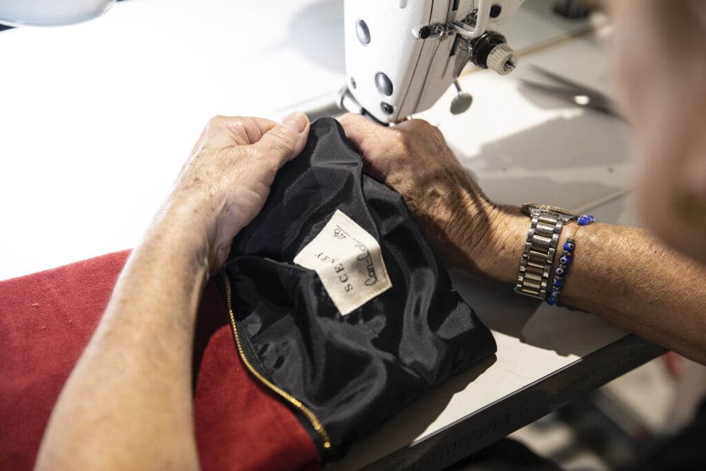 Each bag has a label sewn in with the show's information.  Bags are sewn in Houston, at a factory that pays a family-sustaining wage.