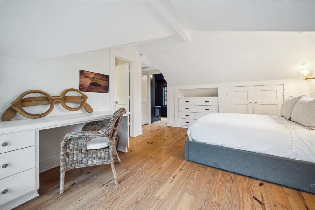 One of six bedrooms at 8899 Sandringham in Houston's Bayou Woods subdivision (Photo by TK Images/Compass)