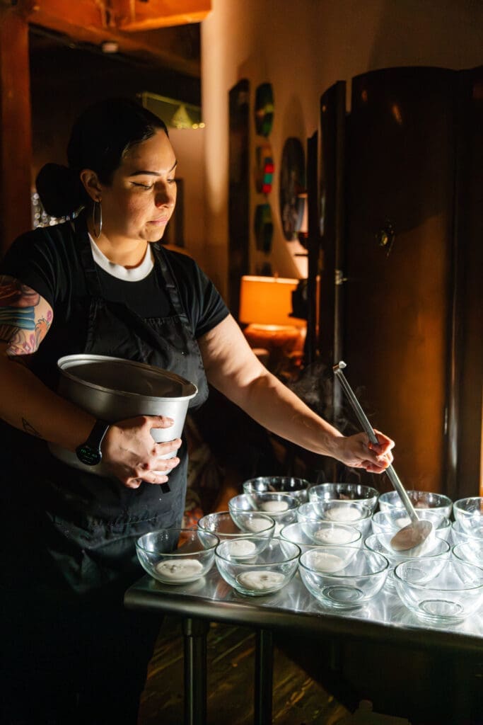 Chef Stephanie Lara setting custard at Sound and Color: Water is for Everyone (Photo by William Issac) 