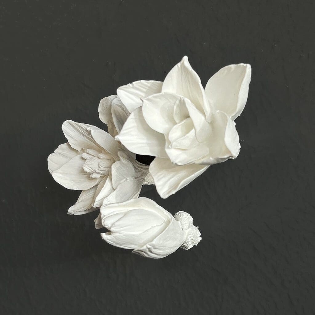 Essian's handcrafted plaster flowers create a lifelike 3D floating garden on your wall. (Courtesy)
