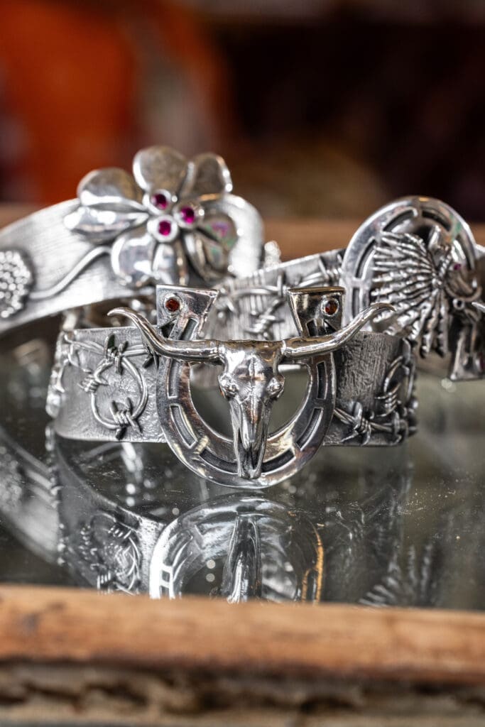 Janis Brous created her brand, Le Spur, which offers 10 different designs of decorative spurs. (Photo by Kathy Tran)
