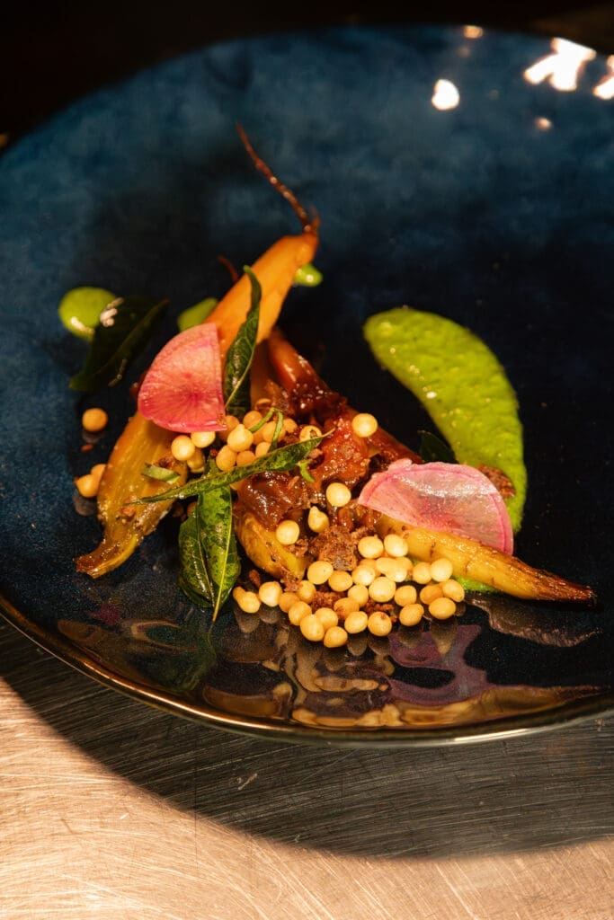 Koji cured carrots, carrot top purree, sweet onion chutney, boondi at Sound and Color: Water is for Everyone (Photo by William Issac)