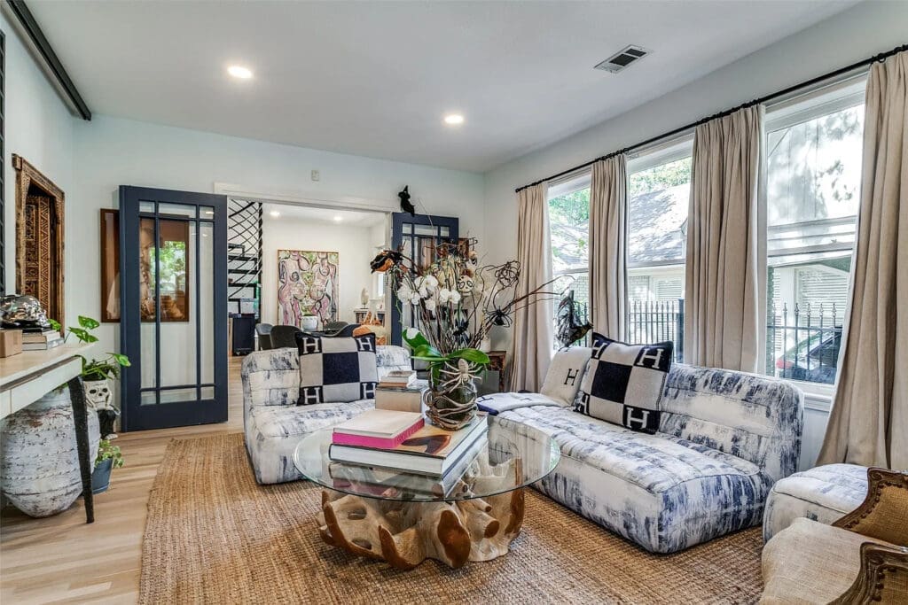 The front door of the bungalow opens to the living room, and then French doors connect it to the dining room.