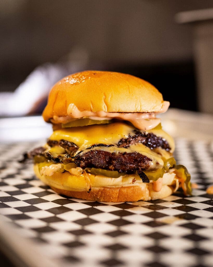 The NADC cheeseburger is made with all-Wagyu beef, onions, pickles, cheese, special sauce, and jalapeños. (Photo by Sarah Block)
