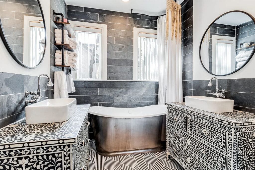 The primary bedroom seems tight, but it "offers a luxurious escape with its spa-like en-suite bathroom," the listing boasts.