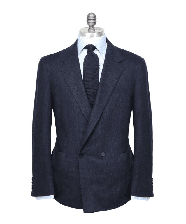 KNT navy double breasted blazer, $6,995, available at Stanley Korshak