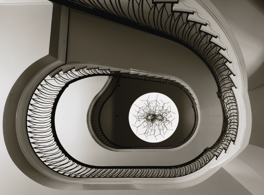 In Marilyn Oshman house, soaring stairs boast the sculptural expertise of Ed Wilson’s organic metal rails and James Surls' dome, which both figuratively and literally mark and apex of the collection. (Photo by Jack Thompson)
