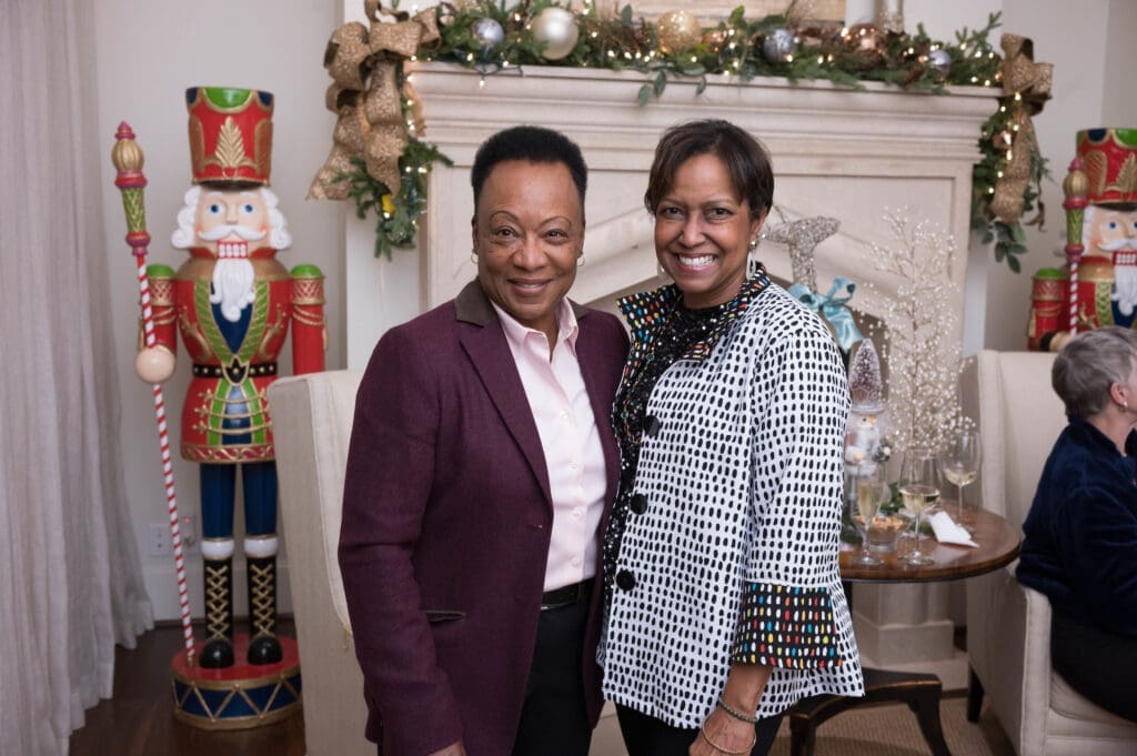 Sharon Land, Linda Gibbs at Legacy Community Health's Holiday Schmooze. (Photo by Daniel Ortiz)
