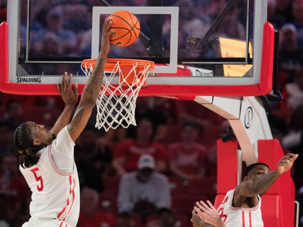 University of Houston center Ja'Vier Francis can finish with authority at the rim. Or protect it. (Photo by F. Carter Smith)