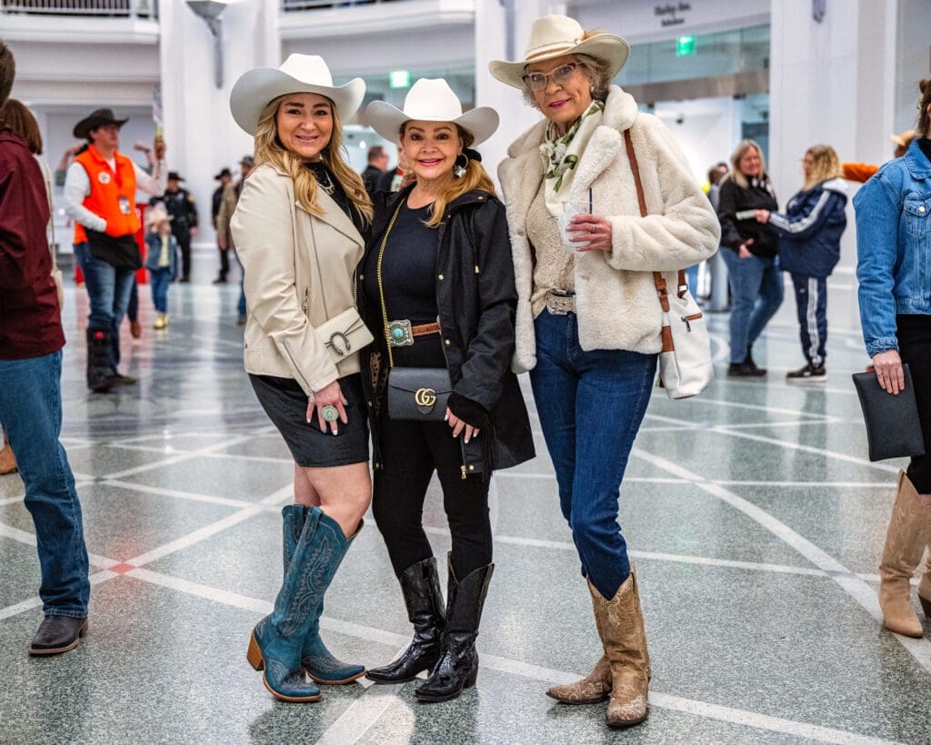 Cowboys and cowgirls, dressed in their finest Western attire and long fur coats, filled Dickies Arena’s lobby with excitement ahead of Monday evening’s competition. (Photo by Walt Burns)