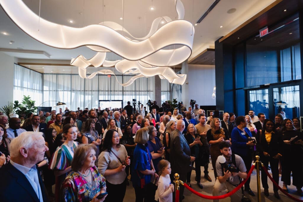 A packed crowd filled the grand opening of One Rangers Way as guests enjoyed live jazz, champagne, and a first look at Arlington’s newest luxury residence. (Courtesy)