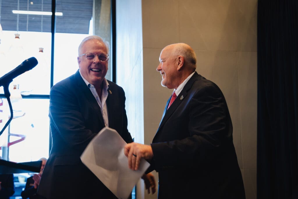 Arlington Mayor Jim Ross (left) attends the grand opening of One Rangers Way. (Courtesy)