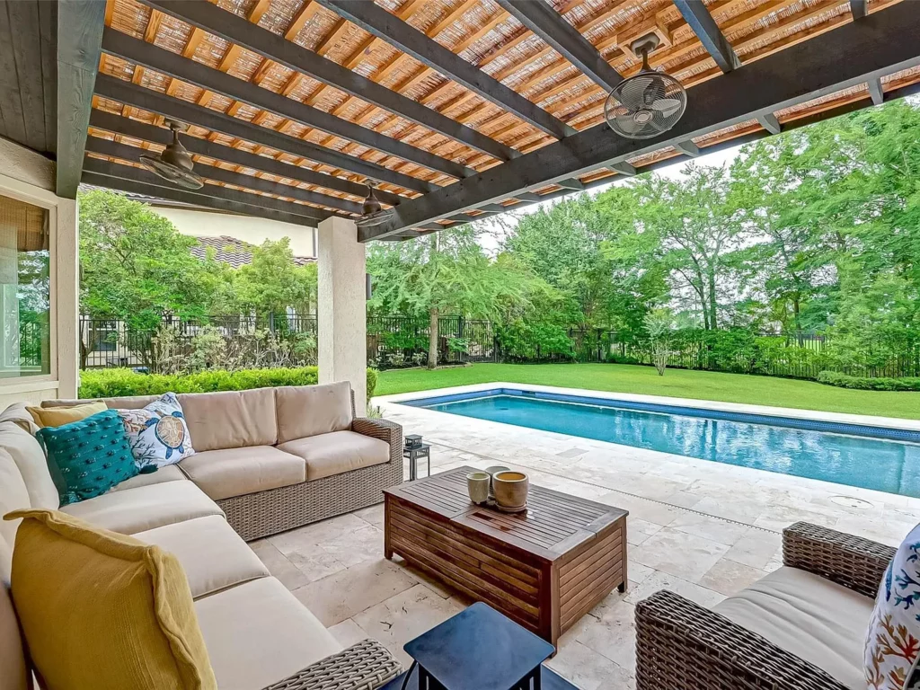 Retreat to a resort-worthy backyard at 14 N Player Manor. 