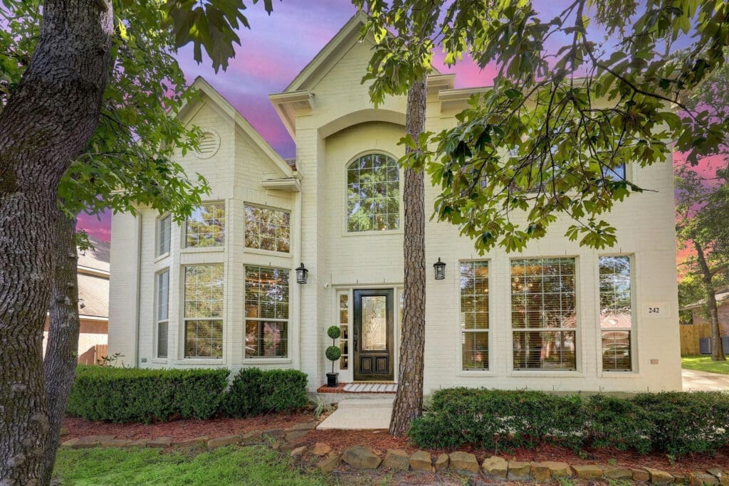 An impressive remodeled home in the Village of Indian Springs is eye-catching with its painted brick front. 