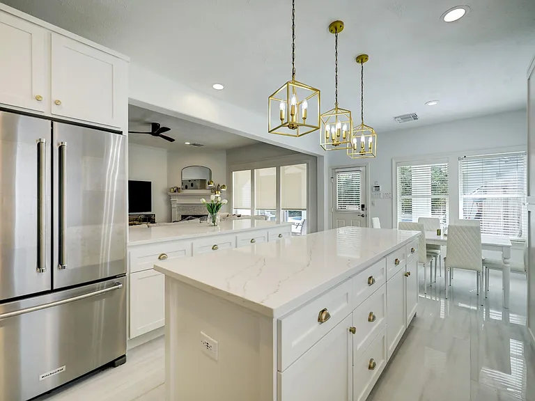 The custom all-new kitchen at 242 Hazelcresh Drive is a pristine delight. 