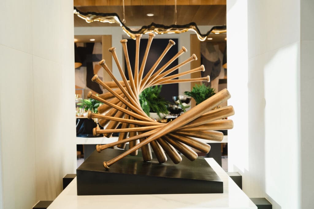 The artwork at One Rangers Way showcases a curated collection of Texas Rangers memorabilia and custom pieces celebrating the team’s legacy. (Courtesy)