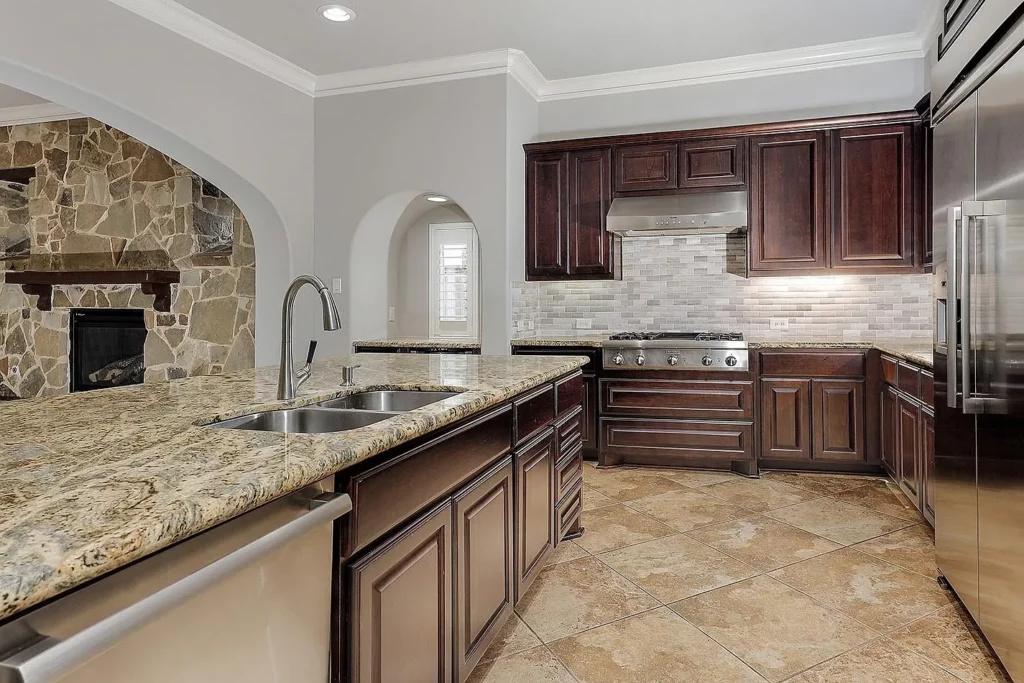The gorgeous countertops, stunning backsplash, and open design make all your kitchen dreams come true at 26 N Player Manor. 