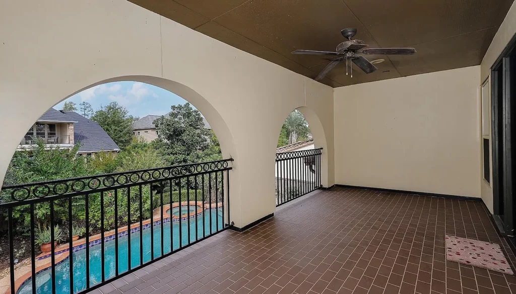 A perfect balcony to look out over the backyard beauty of 26 N Player Manor. 