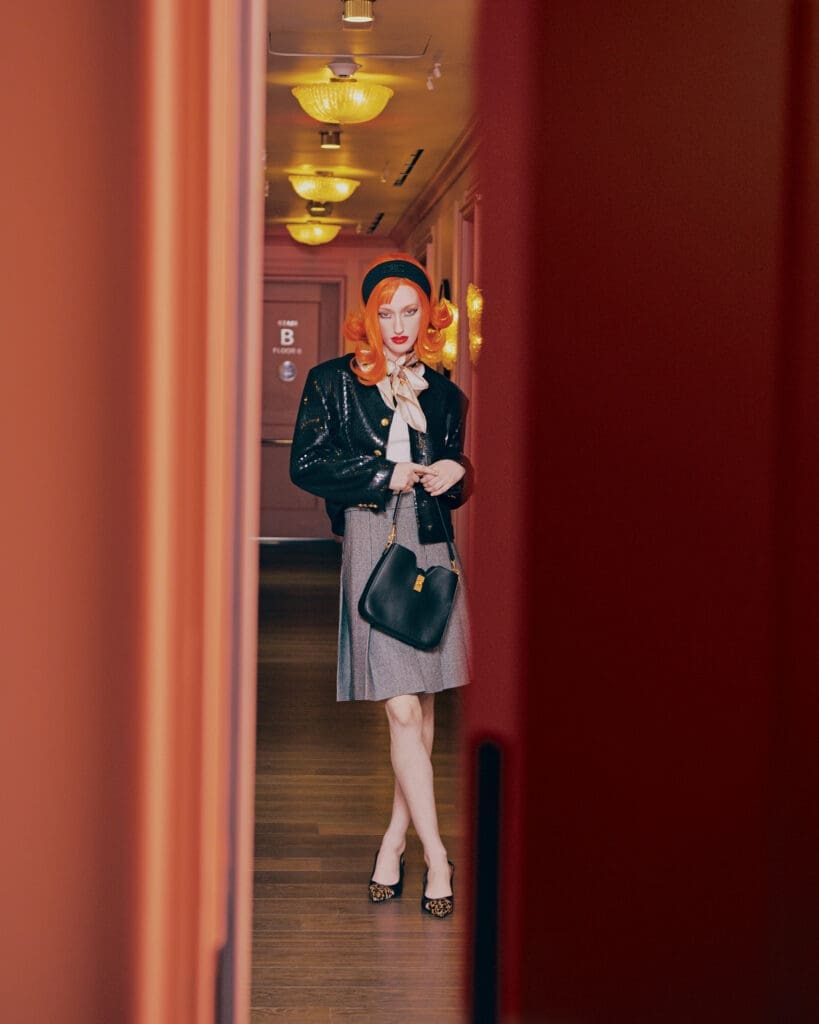 Celine by Hedi Slimane chasseur jacket, Triumph tank top $790, Saint Germain pleated skirt $2,450, small Camillie bag $2,950, cap-toe slingback $1,050, Triomphe headband $530, and square silk twill $590, at Celine Highland Park Village, Forty Five Ten. (Photo by Khristio)