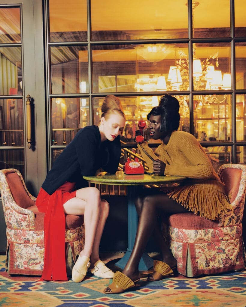 Prada knit cardigan $1,470, shirt $2,250, skirt $1,850, and shoe $1,370, at the Prada boutique. And Michael Kors Collection ribbed raffia-trim dress $2,290, and Catarina raffia-fringe mule $795, at Neiman Marcus. (Photo by Khristio)