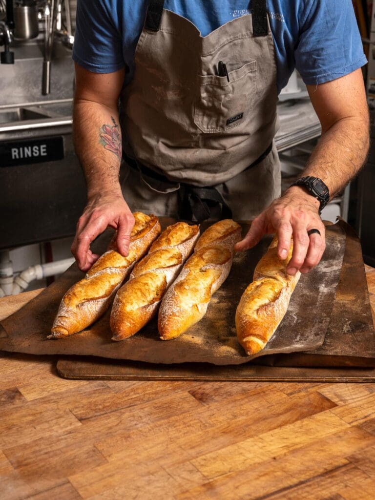 Opened by husband and wife Tyler and Chayanne Rooney at Tyler Station in 2023, this bakery uses Barton Springs Mill grains to bake its fresh Country Sourdough, Seeded Sour, and more breads. (Courtesy)