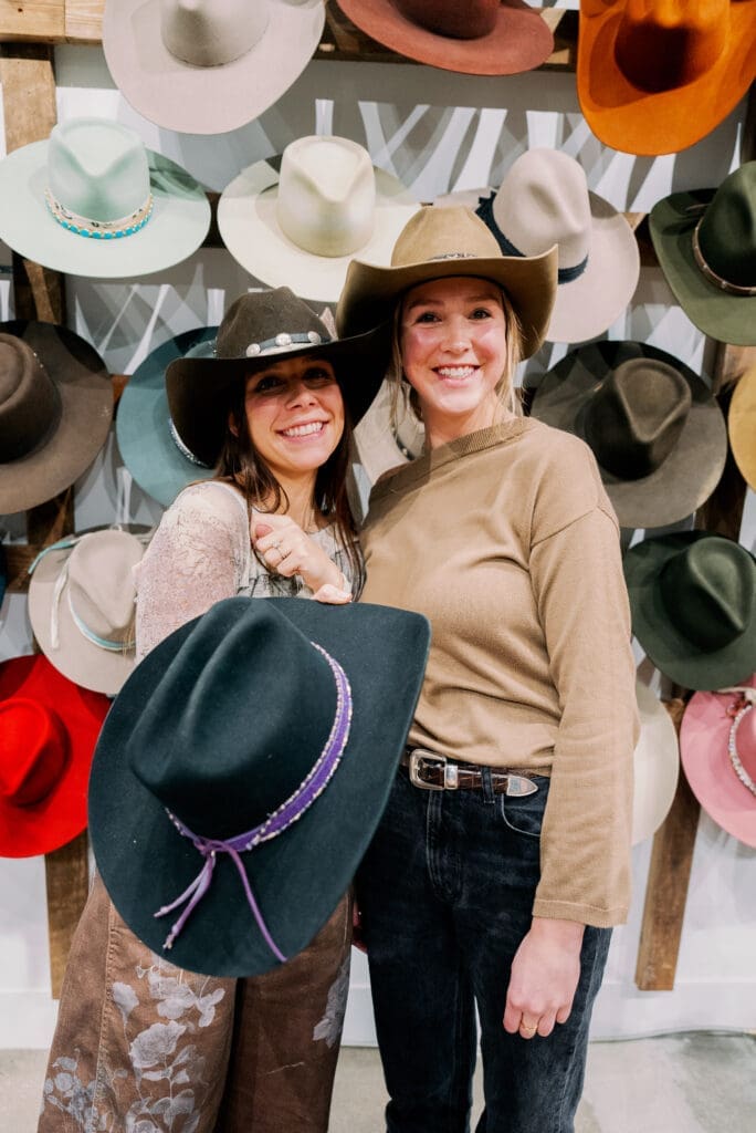 Alix Bersani, Haley Sarasin show off their Kemo Sabe custom cowboy hats. (Photo by Nan Studios)