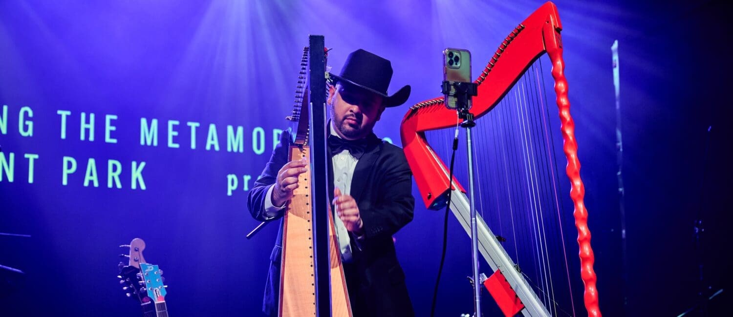 Harpist Alex Martinez entertained on two harps at the Discovery Green Gala. (Photo by Fulton Davenport)