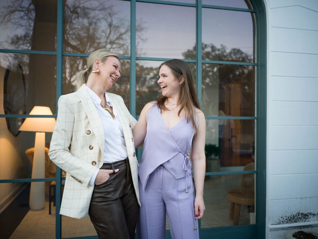SmartFlyer's Libby Taft and Lauren Reckling are enthused at the afternoon event saluting special clients. (Photo by Daniel Ortiz)