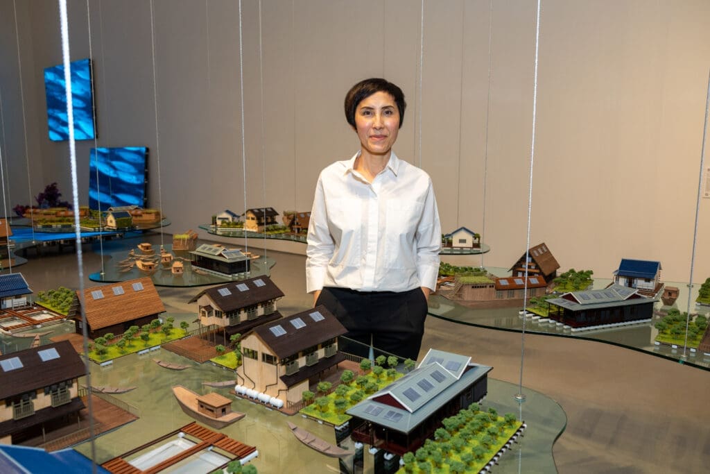 Honoree Tiffany Chung shows off her work at A Dinner for the Moody at Rice University’s Moody Center for the Arts. (Photo by Jenny Antill Clifton) 