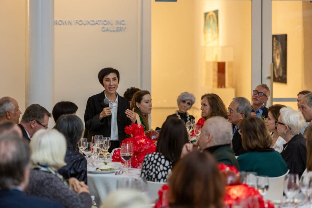 Honoree artist Tiffany Chung speaks to crowd at A Dinner for the Moody at Rice University’s Moody Center for the Arts. (Photo by Jenny Antill Clifton) 