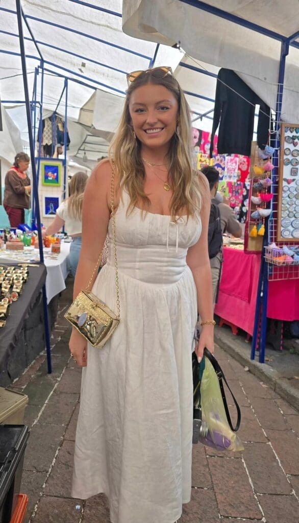 A beaming customer at the San Ángel Market, where people from all over the world discover the unique, handcrafted pieces that carry the legacy of Mexican artisanship. (Photo courtesy Gabriela Torres Zaragoza)