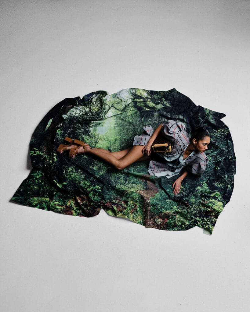 Louis Vuitton jacket $11,500, bodysuit $2,180, short-sleeve lavaliere $3,050, Maya platform sandal $1,170, and side trunk GM $4,400 at Select Louis Vuitton boutiques. (Photo by Enmi Yang)