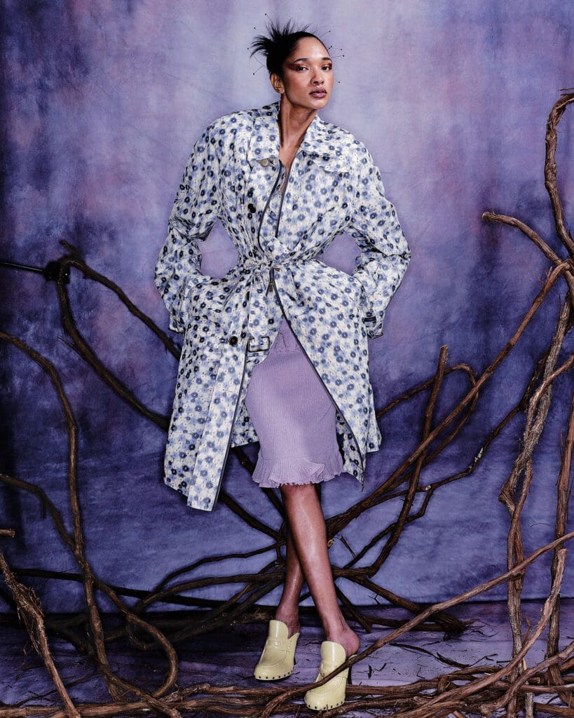 Burberry ruffled silk-blend dress $2,890, long daisy lightweight zip car coat $3,390, and leather potter clog $990 at the Burberry boutique, Neiman Marcus. (Photo by Enmi Yang)
