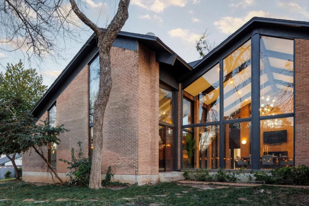 The conscientious restoration succeeded in "elevating[ing] the home while preserving its essence." (Photo by Compass RE Texas)