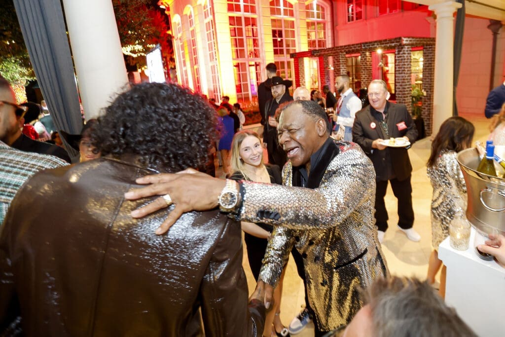 Calvin Murphy welcoming guests to the Rockets Clutch City Foundation gala held on the grounds of the Fertitta family home in River Oaks Photo courtesy of Rockets.com)