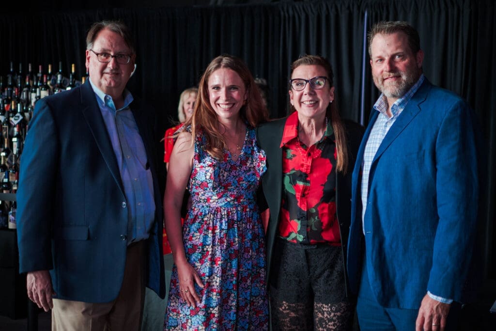 Cynthia Woods Mitchell Pavilion CFO Craig Bourgeois, Ingrid Greiser of Flora Springs Winery, Gina Gallo and Cynthia Woods Mitchell Pavilion CEO and president Jeff Young at the 25th annual Pavilion Partners Wine Dinner. (Photo by The Cynthia Woods Mitchell Pavilion)